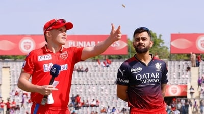 Virat Kohli (Right) is back in charge of RCB for today's game while Sam Curran leads Punjab Kings. (IPL)