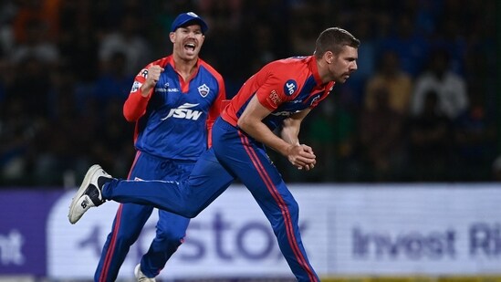Delhi Capitals' Anrich Nortje (R) takes a catch to dismiss Kolkata Knight Riders' Umesh Yadav (not pictured) during the Indian Premier League (IPL) Twenty20 cricket match between Delhi Capitals and Kolkata Knight Riders at the Arun Jaitley Stadium in New Delhi on April 20, 2023. (Photo by Arun SANKAR / AFP)(AFP)