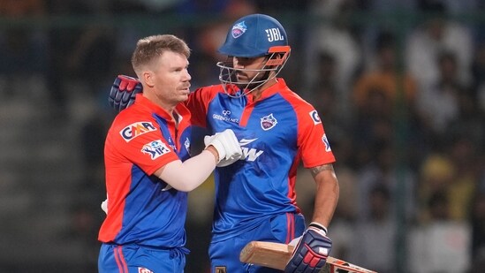 Delhi Capitals' David Warner celebrates his fifty runs with Delhi Capitals' Manish Pandey during Indian Premier League (IPL) match between Delhi Capitals' and Kolkata Knight Riders, in New Delhi, India, Thursday, April 20, 2023. (AP Photo/Manish Swarup)(AP)
