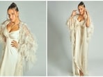 Neha Dhupia enjoys a huge fan following who are not just head-over-heels for her bold personality but also her incredible fashion sense. She never fails to impress fashion gurus with her sartorial picks. Her latest Instagram pictures in a satin dress and feathered cape are here to back our claim.&nbsp;
