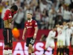 Manchester United's Marcus Rashford, left, reacts after Sevilla's Youssef En-Nesyri scoring his side's third goal during the Europa League quarter finals second leg soccer match between Sevilla and Manchester United, at the Ramon Sanchez Pizjuan stadium in Seville, Spain, Thursday, April 20, 2023. (AP Photo/Jose Breton) Manchester United's Marcus Rashford, left, reacts after Sevilla's Youssef En-Nesyri scoring his side's third goal during the Europa League quarter finals second leg soccer match between Sevilla and Manchester United, at the Ramon Sanchez Pizjuan stadium in Seville, Spain, Thursday, April 20, 2023. (AP Photo/Jose Breton)