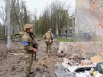 Russia-Ukraine war: A security officer looks at a damaged building, amid Russian invasion on Ukraine. 