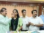 Chairman Dr m Mohan alva and Principal Mohammed Sadakath with topper Chairman Dr m Mohan alva and Principal Mohammed Sadakath with topper
