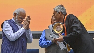 Prime Minister Narendra Modi greets after presenting PM's Award for Excellence in Public Administration 2022 to Anurag Jain, Secretary DPIIT during the Valedictory Session and Awards Ceremony of 16th Civil Service Day. (ANI) Prime Minister Narendra Modi greets after presenting PM's Award for Excellence in Public Administration 2022 to Anurag Jain, Secretary DPIIT during the Valedictory Session and Awards Ceremony of 16th Civil Service Day. (ANI)