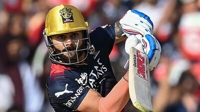 Royal Challengers Bangalore's Virat Kohli plays a shot during the Indian Premier League (IPL) Twenty20 cricket match vs Punjab Kings (AFP)