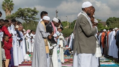 Muslims pray during the first day of the Eid Ul-Fitr at the Ministry of Works club in the Kenyan capital, Nairobi. (AFP) Muslims pray during the first day of the Eid Ul-Fitr at the Ministry of Works club in the Kenyan capital, Nairobi. (AFP)