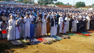 Muslim faithful attend Eid al-Fitr prayers at the Tononoka grounds in the port city of Mombasa, Kenya. (REUTERS)