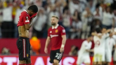 Manchester United's Marcus Rashford, left, reacts after Sevilla's Youssef En-Nesyri scoring his side's third goal during the Europa League quarter finals second leg soccer match between Sevilla and Manchester United, at the Ramon Sanchez Pizjuan stadium in Seville, Spain, Thursday, April 20, 2023. (AP Photo/Jose Breton) (AP) Manchester United's Marcus Rashford, left, reacts after Sevilla's Youssef En-Nesyri scoring his side's third goal during the Europa League quarter finals second leg soccer match between Sevilla and Manchester United, at the Ramon Sanchez Pizjuan stadium in Seville, Spain, Thursday, April 20, 2023. (AP Photo/Jose Breton) (AP)