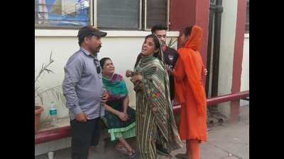 The inconsolable family members of the victims who died after entering a septic tank at a meat plant in Dera Bassi’s Behra village. (HT Photo) The inconsolable family members of the victims who died after entering a septic tank at a meat plant in Dera Bassi’s Behra village. (HT Photo)