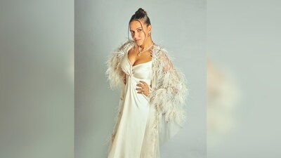 Neha Dhupia's dress features tie-up detailing around the chest and has an asymmetrical flow. (Instagram/@nehadhupia) Neha Dhupia's dress features tie-up detailing around the chest and has an asymmetrical flow. (Instagram/@nehadhupia)