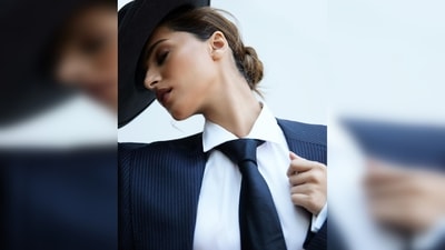 Tara Sutaria donned a white shirt and topped that with a black striped pantsuit and a tie. (Instagram/@tarasutaria) Tara Sutaria donned a white shirt and topped that with a black striped pantsuit and a tie. (Instagram/@tarasutaria)