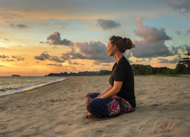 Lying on a beach, watching the waves splash endlessly against the shoreline can wash away everyday care. (Shutterstock) Lying on a beach, watching the waves splash endlessly against the shoreline can wash away everyday care. (Shutterstock)