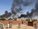 Smoke fills the sky in Khartoum, Sudan, near Doha International Hospital on Friday, April 21, 2023. The Muslim Eid al-Fitr holiday, typically filled with prayer, celebration and feasting, was a somber one in Sudan, as gunshots rang out across the capital of Khartoum and heavy smoke billowed over the skyline. (AP)