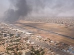 Smoke rises over the city as army and paramilitaries clash in power struggle, in Khartoum, Sudan, April 15. 
