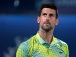 FILE - Serbia's Novak Djokovic looks up during the quarterfinals of the Dubai Duty Free Tennis Championships in Dubai, United Arab Emirates, Thursday, March 1, 2023. Top-ranked Novak Djokovic will miss the Madrid Open, apparently due to a fitness issue, the Spanish event said Saturday, April 22, 2023. (AP Photo/Kamran Jebreili, File) FILE - Serbia's Novak Djokovic looks up during the quarterfinals of the Dubai Duty Free Tennis Championships in Dubai, United Arab Emirates, Thursday, March 1, 2023. Top-ranked Novak Djokovic will miss the Madrid Open, apparently due to a fitness issue, the Spanish event said Saturday, April 22, 2023. (AP Photo/Kamran Jebreili, File)