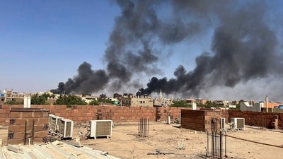 Smoke fills the sky in Khartoum, Sudan, near Doha International Hospital on Friday, April 21, 2023. The Muslim Eid al-Fitr holiday, typically filled with prayer, celebration and feasting, was a somber one in Sudan, as gunshots rang out across the capital of Khartoum and heavy smoke billowed over the skyline. (AP) Smoke fills the sky in Khartoum, Sudan, near Doha International Hospital on Friday, April 21, 2023. The Muslim Eid al-Fitr holiday, typically filled with prayer, celebration and feasting, was a somber one in Sudan, as gunshots rang out across the capital of Khartoum and heavy smoke billowed over the skyline. (AP)