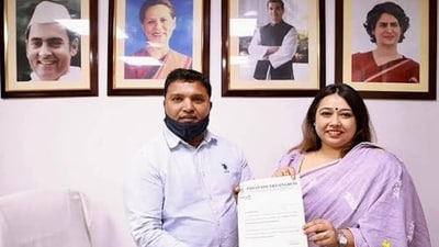 IYC national president Srinivas BV and now-expelled IYC Assam chief Angkita Dutta. (Twitter) IYC national president Srinivas BV and now-expelled IYC Assam chief Angkita Dutta. (Twitter)