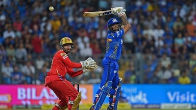 Chasing a target of 215 runs, MI reached 201/6 in 20 overs, despite half-centuries from Cameron Green (67) and Suryakumar Yadav (57). (AFP) Chasing a target of 215 runs, MI reached 201/6 in 20 overs, despite half-centuries from Cameron Green (67) and Suryakumar Yadav (57). (AFP)