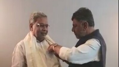 The video shows while Shivakumar fixing the pocket of Siddaramaiah's attire as the duo posed for photos. (Twitter/INCIndia)