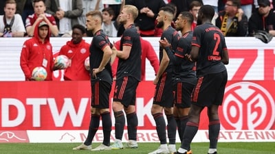 Bayern Munich's players react after the German first division Bundesliga football match between Mainz 05 and FC Bayern Munich (AFP) Bayern Munich's players react after the German first division Bundesliga football match between Mainz 05 and FC Bayern Munich (AFP)