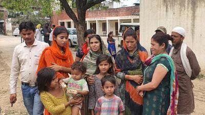 Grieving family members of the victims outside the civil hospital in Dera Bassi on Saturday. While one of the victims, Kurban, is survived by wife and six children, Manak and Janak leave behind a one-year-old daughter and two young kids, respectively. (HT Photo)