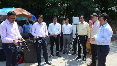 PMRDA metropolitan commissioner Rahul Mahiwal and additional metropolitan commissioner Dipak Singhla introduced these modern micro unmanned aerial vehicles (Drones with cameras) on Friday. (HT PHOTO)