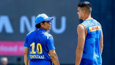 Sachin Tendulkar (L) with Arjun (PTI) Sachin Tendulkar (L) with Arjun (PTI)