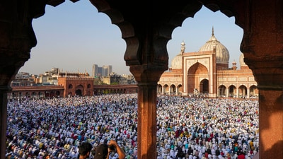 Muslims offer Eid-al-Fitr prayers to mark the end of their holy fasting month of Ramadan at Jama Masjid in New Delhi. (PTI) Muslims offer Eid-al-Fitr prayers to mark the end of their holy fasting month of Ramadan at Jama Masjid in New Delhi. (PTI)