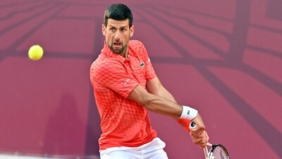 Serbia's Novak Djokovic plays a backhand return to France's Luca van Assche during their tennis singles match at the Sprska Tennis Open ATP 250 series tournament in Banja Luka, on April 19, 2023. (Photo by ELVIS BARUKCIC / AFP) (AFP) Serbia's Novak Djokovic plays a backhand return to France's Luca van Assche during their tennis singles match at the Sprska Tennis Open ATP 250 series tournament in Banja Luka, on April 19, 2023. (Photo by ELVIS BARUKCIC / AFP) (AFP)
