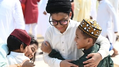 Faces of children fill with joy while celebrating Eid along with their friends. (HT Photo)