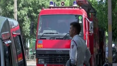 Firefighters at Vikas Bhawan near ITO in Delhi. (ANI) Firefighters at Vikas Bhawan near ITO in Delhi. (ANI)