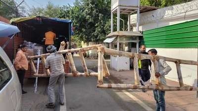 Workers were seen loading Rahul Gandhi's goods in trucks as he vacated his bunglow. (PTI) Workers were seen loading Rahul Gandhi's goods in trucks as he vacated his bunglow. (PTI)