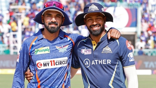 Lucknow Super Giants skipper KL Rahul with Gujarat Titans skipper Hardik Pandya at the toss ahead of their match in the Indian Premier League 2023(IPL Twitter)