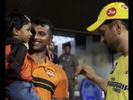 MS Dhoni in conversation with T Natarajan's daughter. MS Dhoni in conversation with T Natarajan's daughter.