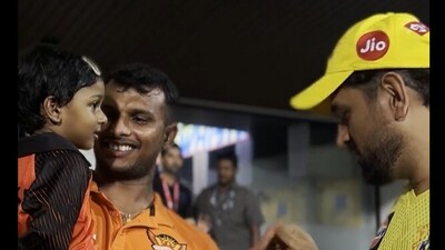 MS Dhoni in conversation with T Natarajan's daughter. (Twitter/@Chennai Super Kings) MS Dhoni in conversation with T Natarajan's daughter. (Twitter/@Chennai Super Kings)