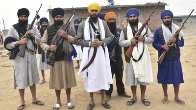 Amritpal Singh, who is accused of secessionist activities, spreading communal disharmony and attacking police officers, and charged under the National Security Act, should now be tried to the fullest extent of the law after a transparent and rigorous probe. (AP) Amritpal Singh, who is accused of secessionist activities, spreading communal disharmony and attacking police officers, and charged under the National Security Act, should now be tried to the fullest extent of the law after a transparent and rigorous probe. (AP)