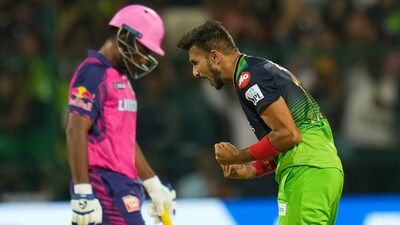 Bengaluru: Royal Challengers Bangalore bowler Harshal Patel celebrates the wicket of Rajasthan Royals batter Sanju Samson during the IPL 2023 cricket match between Royal Challengers Bangalore and Rajasthan Royals, at M Chinnaswamy Stadium in Bengaluru, Sunday, April 23, 2023. (PTI Photo/Shailendra Bhojak)(PTI04_23_2023_000302B) (PTI) Bengaluru: Royal Challengers Bangalore bowler Harshal Patel celebrates the wicket of Rajasthan Royals batter Sanju Samson during the IPL 2023 cricket match between Royal Challengers Bangalore and Rajasthan Royals, at M Chinnaswamy Stadium in Bengaluru, Sunday, April 23, 2023. (PTI Photo/Shailendra Bhojak)(PTI04_23_2023_000302B) (PTI)