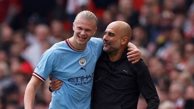Manchester City's Erling Braut Haaland with manager Pep Guardiola after being substituted (Reuters)