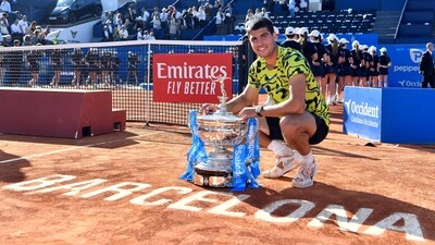 Spain's Carlos Alcaraz poses with his trophy after beating Greece's Stefanos Tsitsipas during the ATP Barcelona Open (AFP) Spain's Carlos Alcaraz poses with his trophy after beating Greece's Stefanos Tsitsipas during the ATP Barcelona Open (AFP)