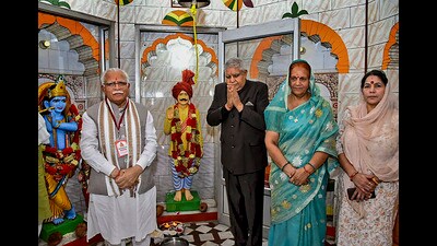 Vice-President Jagdeep Dhankhar with his wife Sudesh Dhankhar and Haryana Chief Minister Manohar Lal Khattar at Saint Shiromani Dhanna Bhagat temple, in village Dhanori, Haryana, on Sunday.