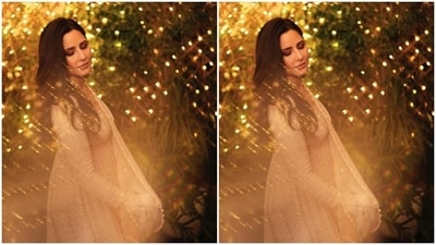 Katrina looked every bit gorgeous in the ivory white anarkali with sequin details and a plunging neckline. She further teamed it with a matching georgette dupatta. (Instagram/@katrinakaif) Katrina looked every bit gorgeous in the ivory white anarkali with sequin details and a plunging neckline. She further teamed it with a matching georgette dupatta. (Instagram/@katrinakaif)