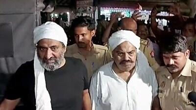 Moments before mafia-turned-politician Atiq Ahmad and his brother Ashraf were shot dead outside a Prayagraj hospital. Moments before mafia-turned-politician Atiq Ahmad and his brother Ashraf were shot dead outside a Prayagraj hospital.