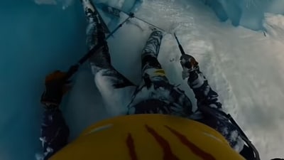 While skiing on a skilled path, a member of the French skiing group Les Powtos encountered a sudden hole beneath him, which caused him to fall rapidly into darkness. (Instagram)