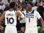 Anthony Edwards #1 of the Minnesota Timberwolves celebrates with Mike Conley #10 during overtime against the Denver Nuggets at Target Center on April 23, 2023 in Minneapolis, Minnesota. Anthony Edwards #1 of the Minnesota Timberwolves celebrates with Mike Conley #10 during overtime against the Denver Nuggets at Target Center on April 23, 2023 in Minneapolis, Minnesota.