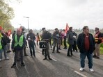 Protestors gather during a demonstration against pension reform in Nesle, France. Protestors gather during a demonstration against pension reform in Nesle, France.