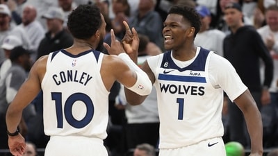 Anthony Edwards #1 of the Minnesota Timberwolves celebrates with Mike Conley #10 during overtime against the Denver Nuggets at Target Center on April 23, 2023 in Minneapolis, Minnesota. (Getty Images via AFP) Anthony Edwards #1 of the Minnesota Timberwolves celebrates with Mike Conley #10 during overtime against the Denver Nuggets at Target Center on April 23, 2023 in Minneapolis, Minnesota. (Getty Images via AFP)