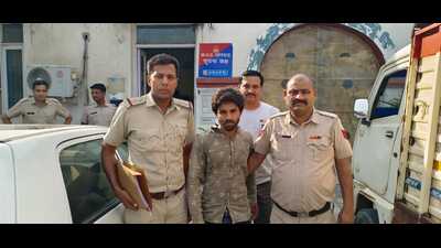 Police with the accused, identified as Vishal Sharma, following his arrest after fleeing from the Pinjore police station. (HT Photo) Police with the accused, identified as Vishal Sharma, following his arrest after fleeing from the Pinjore police station. (HT Photo)