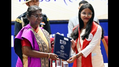 President Droupadi Murmu felicitates degree to the outgoing student at 19th convocation of ICAR–National Dairy Research Institute, in Karnal on Monday. She hailed women dairy farmers for their contribution in making the country self-reliant in milk production. (ANI)