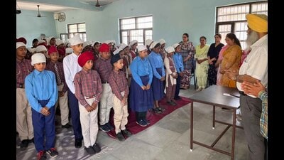 Students and teachers during a remembrance ceremony in Shahpur, Ludhiana, on Monday. (HT Photo) Students and teachers during a remembrance ceremony in Shahpur, Ludhiana, on Monday. (HT Photo)