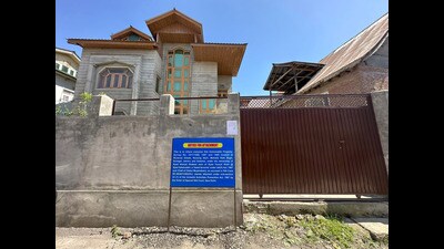 The property attached by the National Investigation Agency (NIA) in Ram Bagh area in Srinagar on Monday. (Waseem Andrabi /HT)